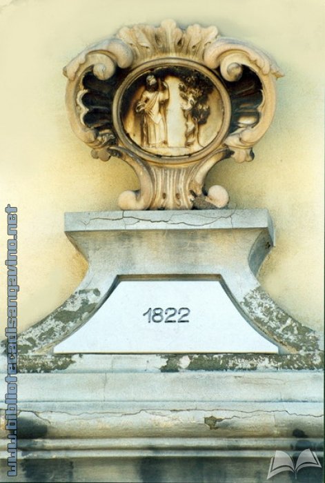 Casa Melas, stemma sulla facciata